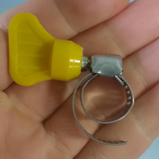 A butterfly hose clamp